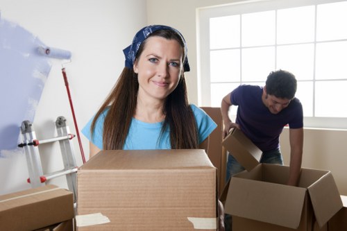 Unpacking boxes in a Maida Vale apartment after relocation