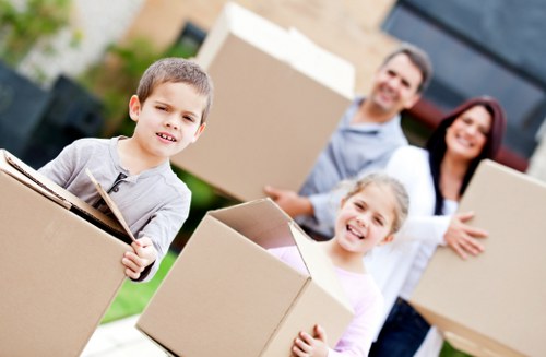 Professional movers handling furniture in a Maida Vale property